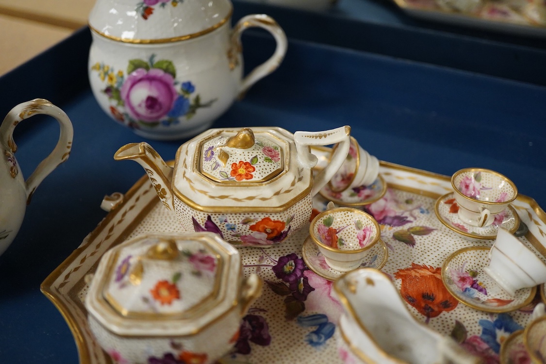 A pair of Meissen Marcolini period floral custard cups & covers together with an early 19th century English porcelain miniature tea set on tray, largest 20cm wide